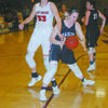 FIGHTING FOR A REBOUND: Marlow’s Brooke Morriston fights off Comanche’s Misty Dossey in the championship game of the Stephens County Tournament on Saturday. Comanche won the game, 52-26.