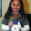 HAVE PASSPORT, WILL TRAVEL: Lenny the moose had his picture taken with Aiesha Patel, with whom he traveled to India for three weeks. Her family made him the traditional Indian clothes to wear.