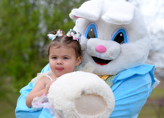 Ellie Amos, 18 months, makes a face while the Easter Bunny holds her for a photo at Redbud Park on Saturday, March 30, 2024. 
Photo by Toni Hopper/The Marlow Review