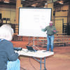 LISTENING IN: Participants of the Cow/Calf Boot Camp listen to speakers at one of the workshops at the Stephens County Fairgrounds on Monday afternoon.