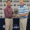 Travis Ortega receives a plaque of appreciation from Marlow superintendent George Coffman