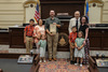 John Patrick, of Sand Springs, and his family visited the state Capitol before donating a copy of 1913 legislation that appropriated funding for the building.