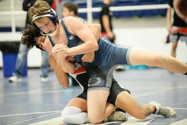 Marlow Outlaw wrestler Jack Glover, 9th grade, placed third, and won
by fall over Carter Adams of Cache, in the 126 division during the Outlaw
Open, Nov. 23. Glover scored 14.0 team points. Photo by Toni Hopper/
The Marlow Review