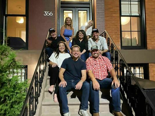 Kenny Baker and family visited “Stillwater” director Tom McCarthy’s home while in New York City for the movie premiere. Front row, from left: Matt Damon, Kenny Baker. Middle: Madison Baker. Third row: Tom McCarthy, Davey Porter, casting director Phil Messina. Back row: Monica Baker, Wendy McCarthy.

Photo courtesy of Kenny Baker