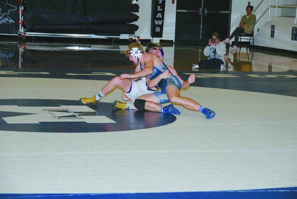 Marlow's Jayden Absher gets the upper hand on his Chickasha opponent.
