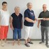 Lakeside Baptist Church pastor Lawrence Gresham presents a check to Bray Food Pantry officers