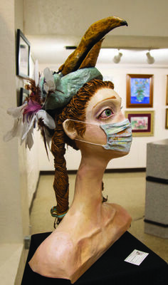 “The Masks We Wear,” a sculpture by Katherine Farrow, was chosen Best in Show at Chisholm Trail Arts Council’s annual Holiday Art Show.
