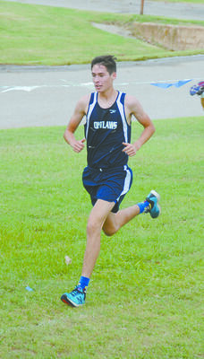 REGIONAL CHAMP: Noah Davis, pictured here competing earlier this season, won the individual regional championship and led the Outlaws to a second-place team finish last Saturday.