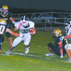 SIDESTEP: Marlow running back Owen Waxell tries to maneuver himself through the Kingfisher defense in the Outlaws’ 42-21 road loss in the season opener last Friday.