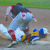 CLOSE PLAY: Central High’s Landon Burton gets called out trying to dive back to first base in the Bronchos’ game against Vanoss at the Central High Spring Festival last Friday.