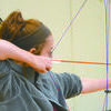 READY, AIM, FIRE: Aspen Cothern competes at the first archery meet of the season at Bray-Doyle last week.