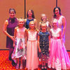 Members of the GymJam gymnastics team at the AAU Oklahoma All-State Championship Banquet are front row, left to right: Kimber McCarley, Elizabeth Hutton, Sophia Fincher, Braylee Fish. Back row: Coach Leslie Bogue, Britney Mackey, Julianna Chesnut, coach Courtney Fish.