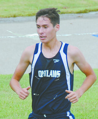 REGIONAL CHAMP: Noah Davis, pictured here competing earlier this season, won the individual regional championship and led the Outlaws to a second-place team finish last Saturday.