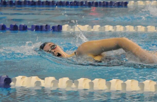 Morgan Warren works the water in the 200-yard freestyle race at State on Friday.

Photo by Elizabeth Pitts-Hibbard/The Marlow Review