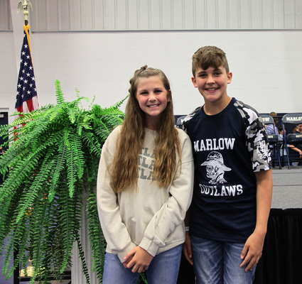 Marlow Elementary School honored its fifth-grade students with a promotion ceremony, Thursday, May 18, 2023, at the Outlaw Gymnasium. Several awards were also presented for academic achievements. Receiving the Kaleb Pinson Outlaw Award were Brekyn Foss and Noah Ottinger. The award was presented by 5th-grade teacher Laurie Eveland. 
Photo by Toni Hopper/The Marlow Review