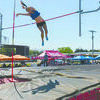 FLYING HIGH: Central High’s Destyne Robbins clears the bar at the Class A State Meet to win the pole vault state title.