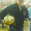 PRIZE CHICKEN: Cameron Freeman of Marlow holds one of his broilers that helped him win third place overall and collect $500 at the Tulsa State Fair.