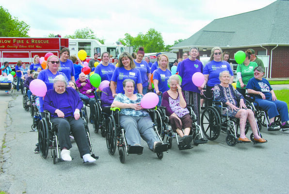 All smiles and sunshine as residents head out for the annual "Spring Stroll"

Photo by Elizabeth Pitts-Hibbard