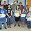 NOVEMBER HONOREES: Students honored as Students of the Month for November at the Bray-Doyle School Board meeting Monday included: (front row) Caleb Noble, Cara Mangus, Morgan Pass, Sadie Budlong, and Kyson Cox. Second row includes board members Clayton Kilbourn, Eric Dorman, Russell Talley, Brian Bearce, Sara Long, and superintendent David Eads.