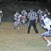 BIG GAIN: Marlow running back Brandon Green breaks through the line in the Outlaws’ 19-8 win at Anadarko last Friday.